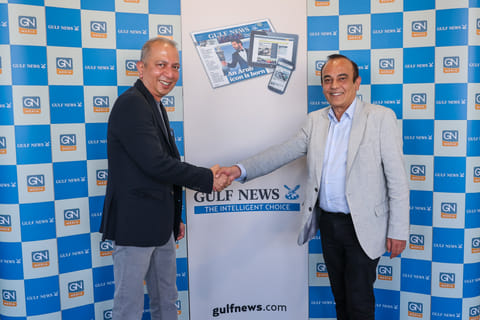 Vijay Vaghela (right), Interim CEO, Gulf News, and Shekhar Iyer, Director and General Manager at BMEG ME FZ LLC, after signing the partnership deal between Gulf News and Magzter. 