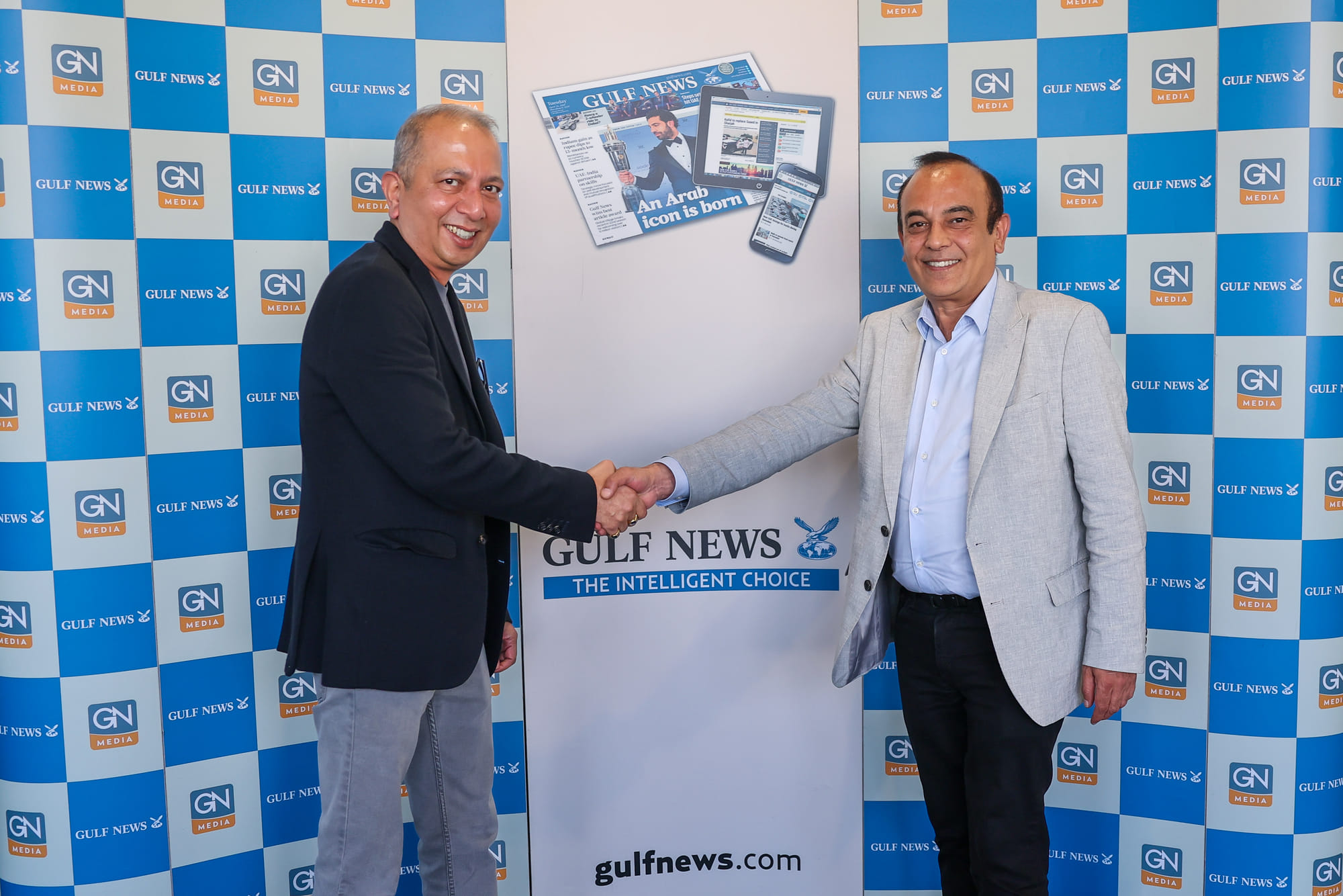 Vijay Vaghela (right), Interim CEO, Gulf News, and Shekhar Iyer, Director and General Manager at BMEG ME FZ LLC, after signing the partnership deal between Gulf News and Magzter.