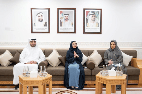 Sarah Al Amiri (centre) announces the revamped high school streams during  a media briefing