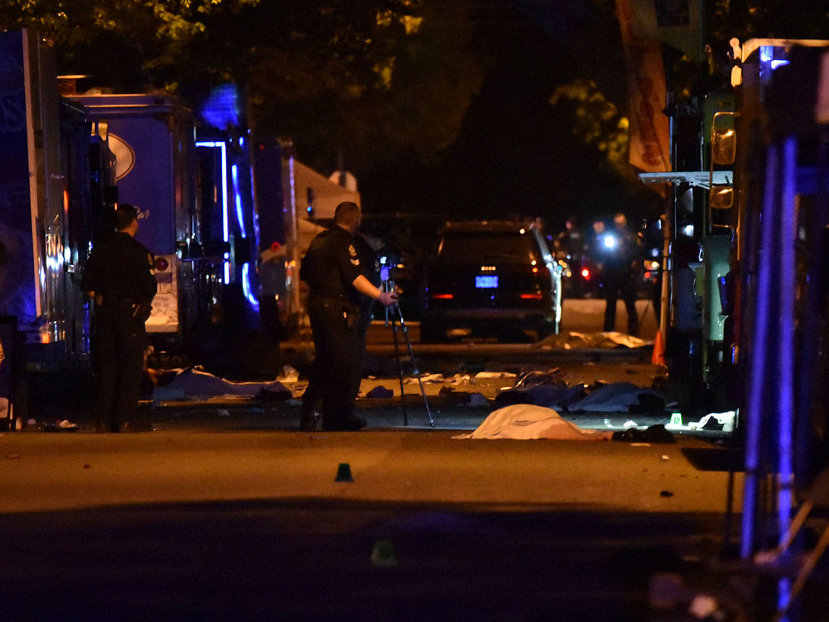Vancouver police investigate a crime scene after a man drove into pedestrians at the annual Lapu Lapu festival celebrating Filipino culture, at East 43rd Avenue and Fraser, in the south of Vancouver on April 26, 2025.