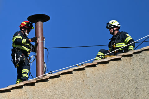 Workers install the chimney on the roof of the Sistine Chapel in The Vatican, on May 2, 2025.