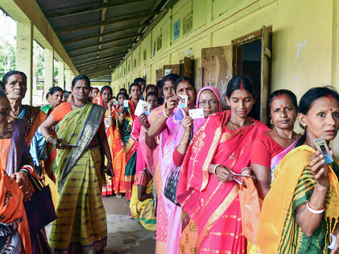Voters wait in a queue to cast their votes during Assam Panchayat Election, at a Baraigram polling centre in Sribhumi on Friday, May 2, 2025. The Indian government has announced that a caste census will be conducted along with the next population census.