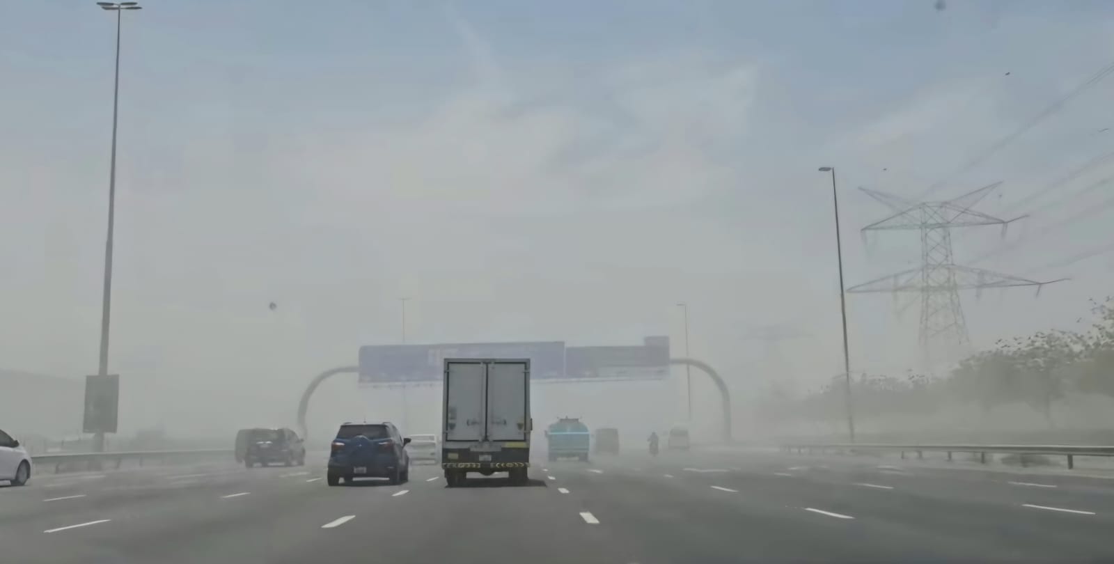 Dust storm sweeps Dubai: Motorists warned of poor visibility and temperature dip.