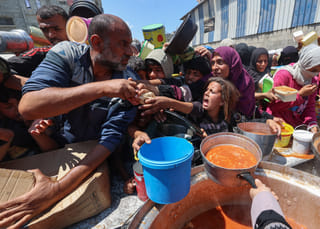 Father of six killed 'for piece of bread' during Gaza aid distribution