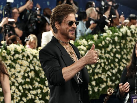 Shah Rukh Khan dialed up the swagger in a suave Sabyasachi all-black ensemble. We like the way he ruled the Met Gala debut with his modern Maharaja swag.
