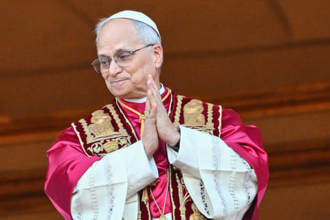 Newly elected Pope Leo XIV, Robert Francis Prevost arrives on the main central loggia balcony of the St Peter's Basilica for the first time, after the cardinals ended the conclave, in The Vatican, on May 8, 2025.