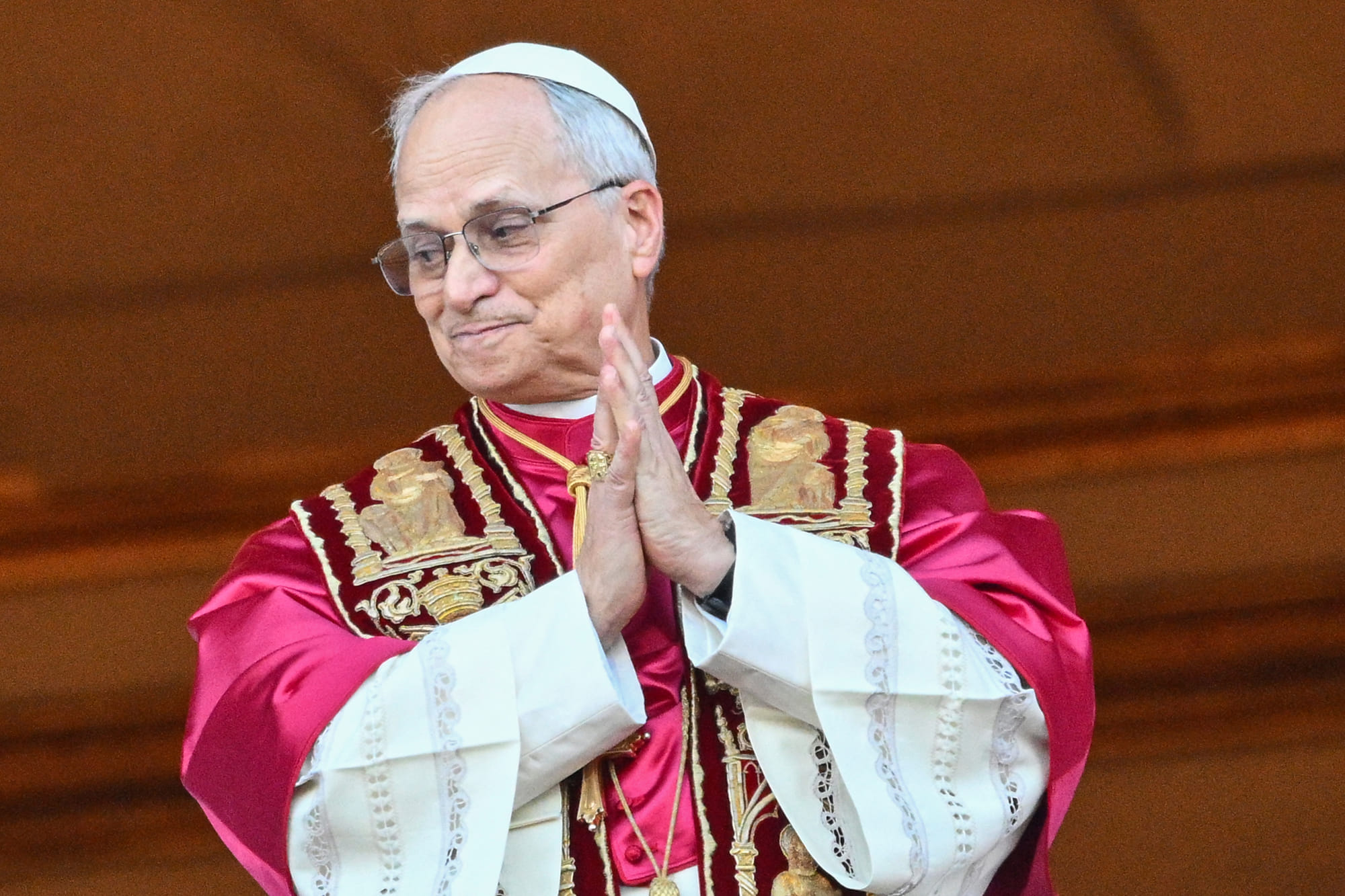 Newly elected Pope Leo XIV, Robert Francis Prevost arrives on the main central loggia balcony of the St Peter's Basilica for the first time, after the cardinals ended the conclave, in The Vatican, on May 8, 2025.