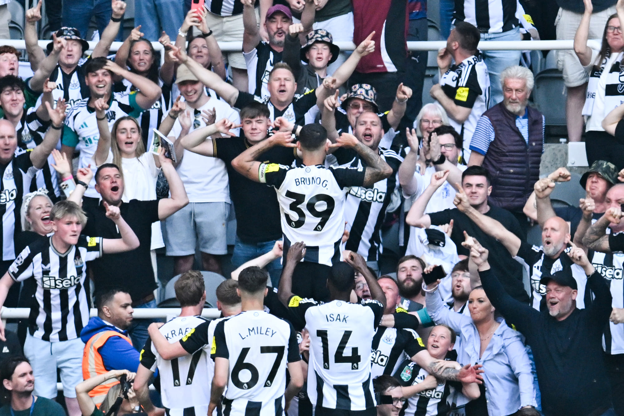 Newcastle United's Brazilian midfielder Bruno Guimaraes celebrates after scoring his team second goal during the English Premier League football match against Chelsea at St James' Park in Newcastle-upon-Tyne, north east England on May 11.