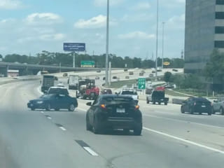 Viral video: Man recklessly tows car in reverse on busy highway, gets arrested