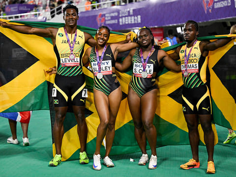 From left: Jamaica's Bryan Levell, Krystal Sloley, Serena Cole and Javari Thomas celebrate after finishing second in the mixed 4x100m relay final of the World Athletics Relays in Guangzhou.
