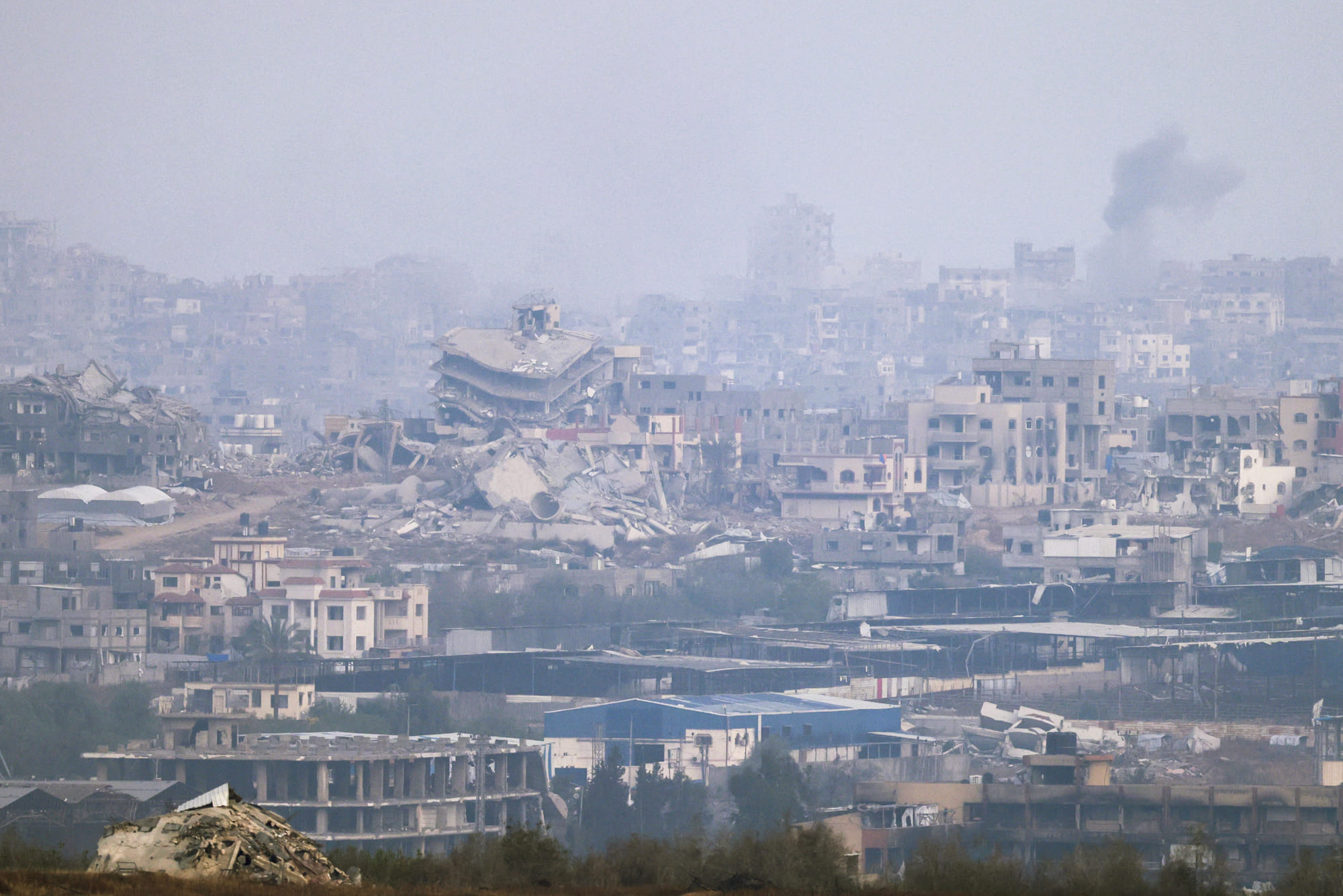 A picture taken from a position at the Israeli border with the Gaza Strip shows smoke billowing due to Israeli bombardment in the besieged Palestinian territory on May 18, 2025.