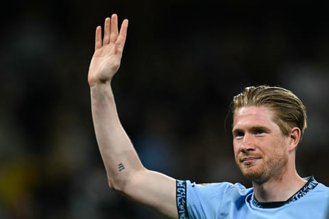 Manchester City's Kevin De Bruyne waves to supporters after playing his last match at the Etihad Stadium on Sunday.