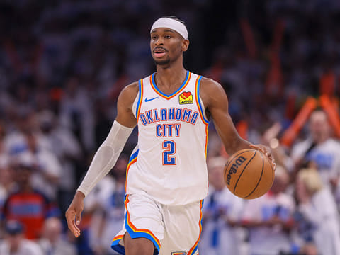 Oklahoma City Thunder guard Shai Gilgeous-Alexander dribbles the ball up court against Minnesota Timberwolves during the second half of Game 1 of an NBA basketball Western Conference Finals playoff series in Oklahoma City.