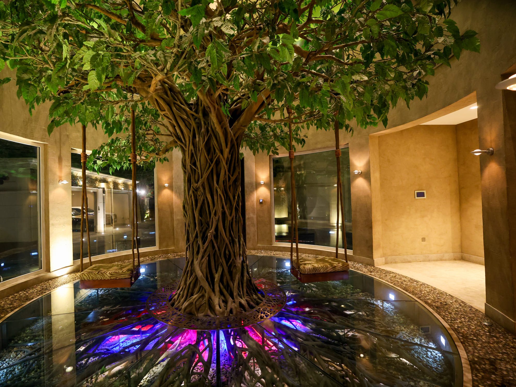 A giant banyan tree greets us at the foyer of Mahesh Tourani's mansion in Dubai's Emirates Hills