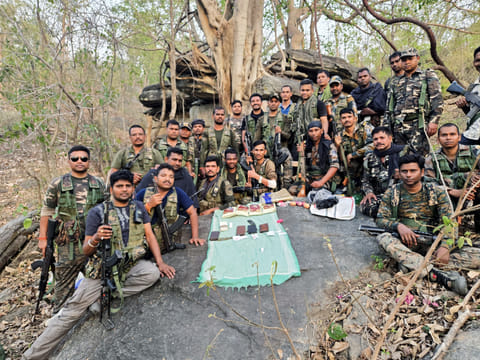 Security personnel with materials seized from Naxalites recently.