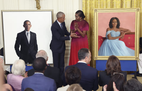 Former U.S. President Barack Obama and former first lady Michelle Obama unveil their official White House portraits during a ceremony at the White House on September 7, 2022 in Washington, DC. 