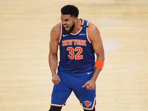 New York Knicks center Karl-Anthony Towns (32) reacts after scoring against the Indiana Pacers during the second half of Game 3 of the Eastern Conference finals of the NBA basketball playoffs.