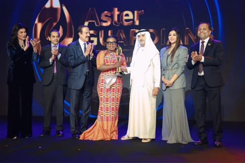 Sheikh Nahyan bin Mubarak Al Nahyan and Indian actress Sushmita Sen honour nurse Naomi Oyoe Ohene Oti, 48. Also seen in the photo are Dr Azad Moopen and Alisha Moopen.