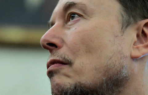 Elon Musk listens attends a meeting between U.S. President Donald Trump and South Africa President Cyril Ramaphosa in the Oval Office at the White House on May 21, 2025 in Washington, DC. 