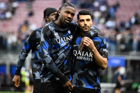 Inter Milan's French forward #09 Marcus Thuram (L) and Inter Milan's Iranian forward #99 Mehdi Taremi at San Siro stadium in Milan,
