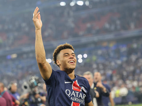 PSG's Desire Doue celebrates after the Champions League final soccer match between Paris Saint-Germain and Inter Milan at the Allianz Arena in Munich, Germany