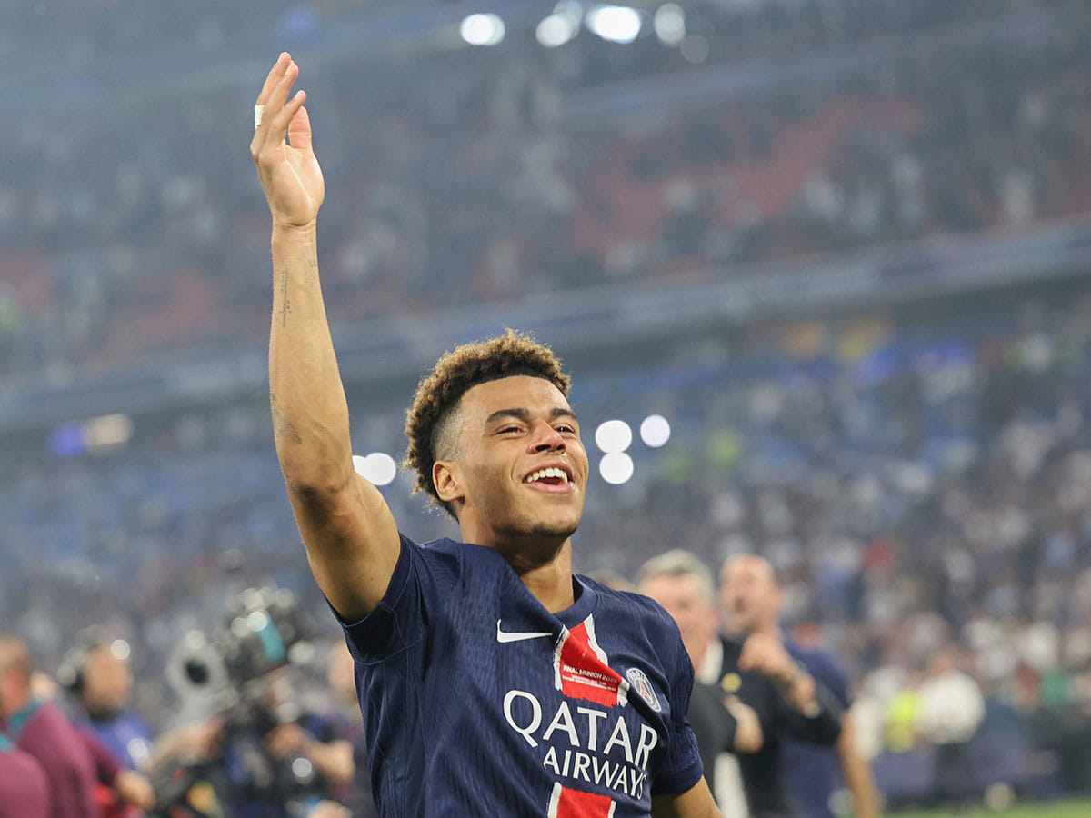 PSG's Desire Doue celebrates after the Champions League final soccer match between Paris Saint-Germain and Inter Milan at the Allianz Arena in Munich, Germany