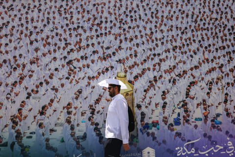 A worshipper walks on the streets in Mecca during the Hajj pilgrimage on June 2, 2025.