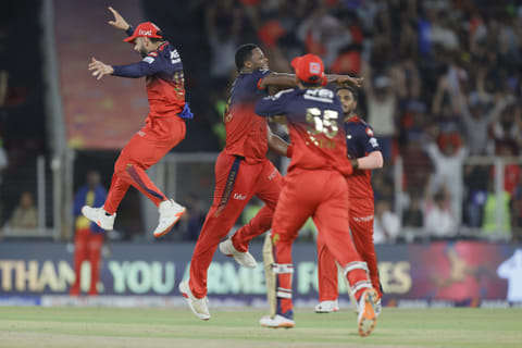 RCB players celebrate the wicket of Punjab skipper Shreyas Iyer during the final in Ahmedabad on Tuesday.