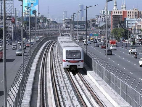 A train undergoes a trial run on the under-construction Metro Rail Transit Line 7 (MRT-7). The $1.27-billion project is expected to boost connectivity between Manila and the province of Bulacan, running along Commonwealth Avenue in Quezon City.