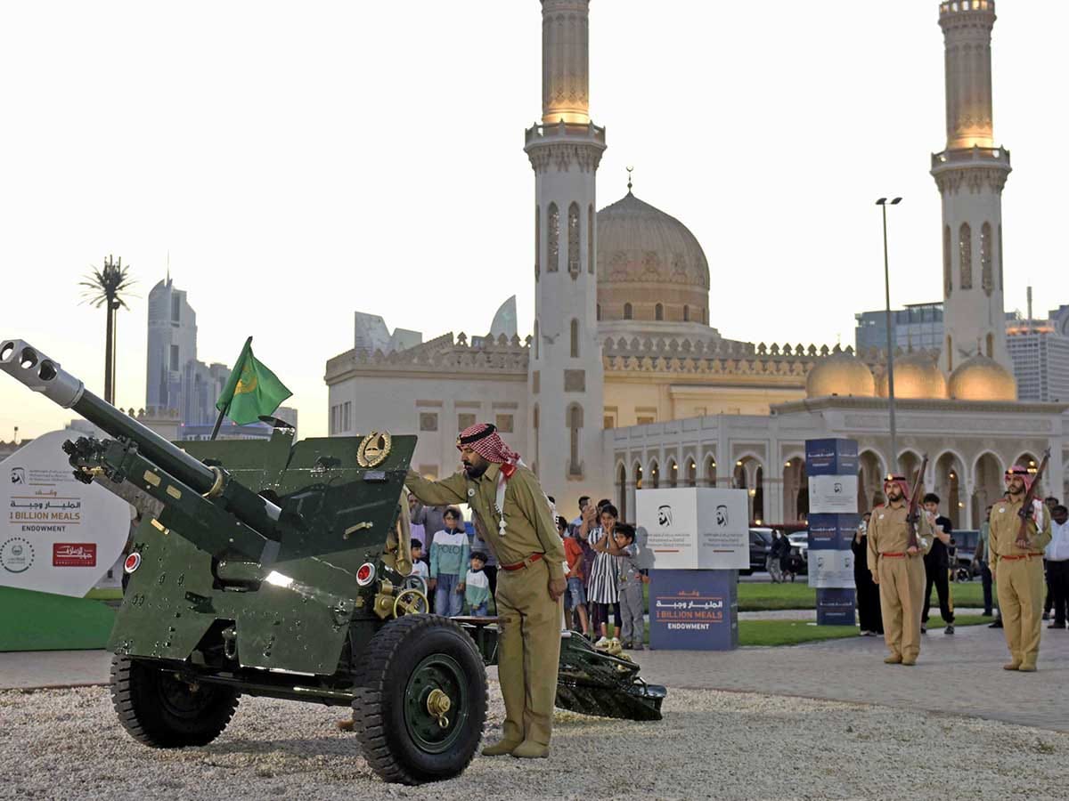 Dubai Police officials at the ceremonial cannon firing for Eid Al Adha. The 901 service received not only phone calls but also 919 emails and 144 live chats via the Dubai Police website.