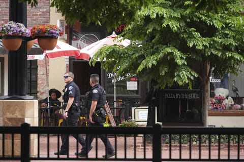 Officers at the Pearl Street Mall in front of the county courthose where an attack occurred on June 2, 2025, in Boulder.