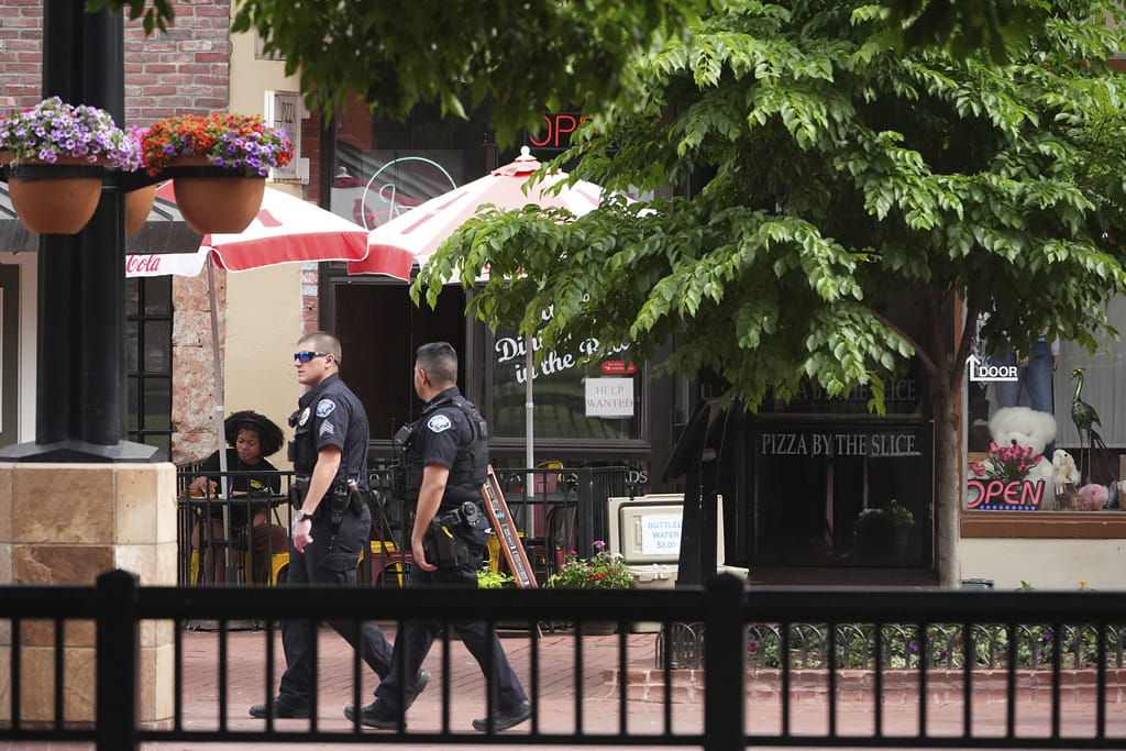 Officers at the Pearl Street Mall in front of the county courthose where an attack occurred on June 2, 2025, in Boulder.