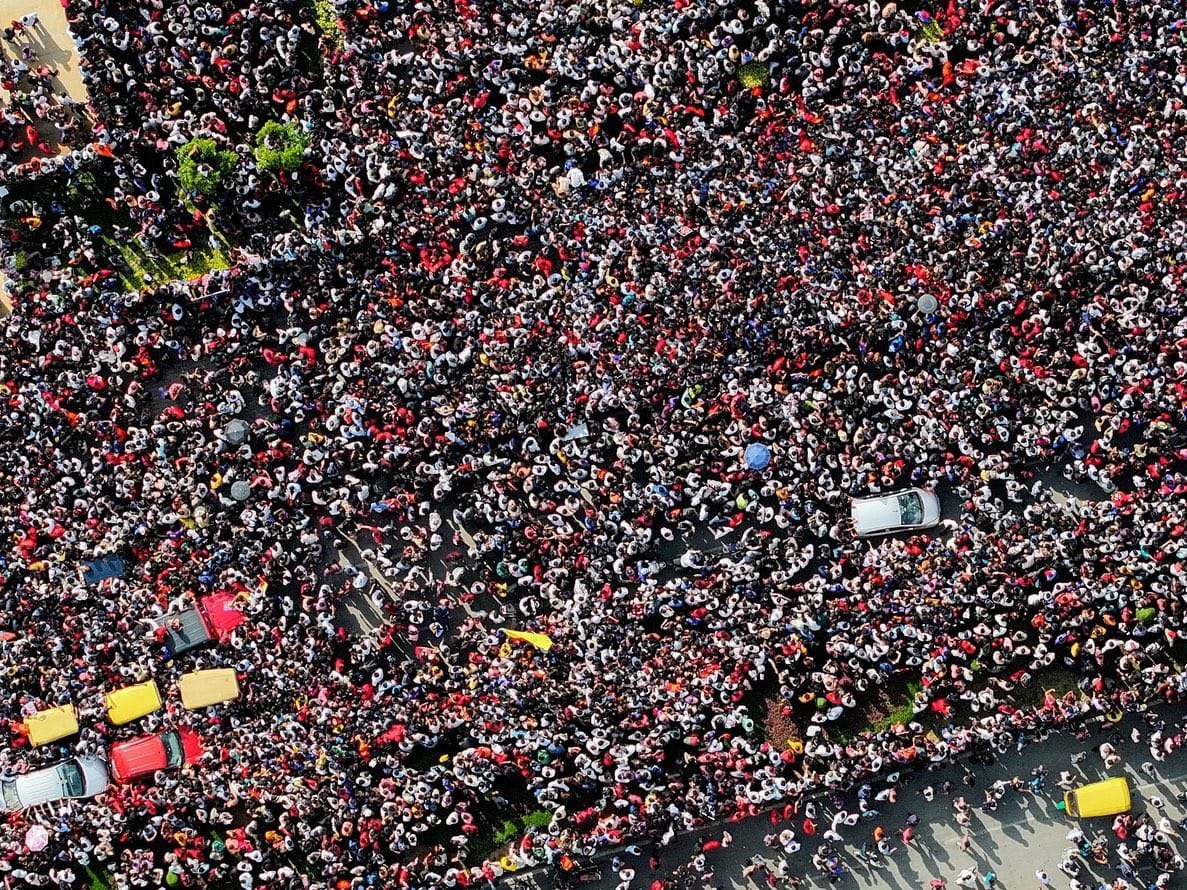 A massive crowd gathered for the Royal Challengers' victory celebrations near Vidhana Souda in Bengaluru on Wednesday.
