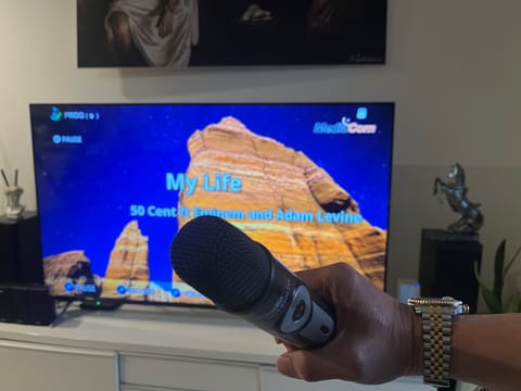 Whether at home or abroad, karaoke remains a beloved Filipino tradition that unites voices, tells stories, and keeps the community spirit alive.