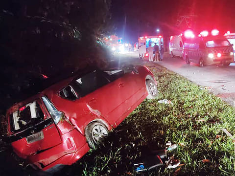 This handout photo taken and released by Perak's Fire and Rescue Department on June 9, 2025 shows a minivan after it collided with a bus in Gerik-Jeli, in Malaysia's Perak state. 