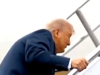 Caught on camera: Donald Trump and Marco Rubio stumble on Air Force One steps after tough talk on protests