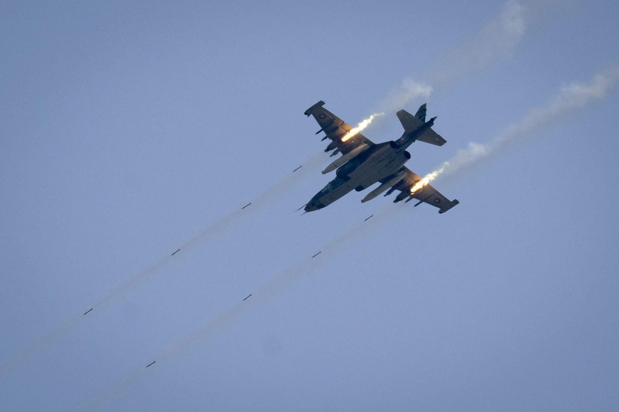 A Bulgarian Su-25 jet fighter fires missiles during a demonstration of capabilities of the international tactical live-fire exercise "Balkan Sentinel 25" at the Koren Training Area on June 9, 2025.