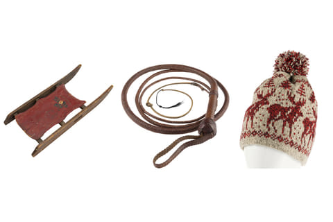 This combination of images shows the Rosebud sled from the film “Citizen Kane," left, a whip wielded by Harrison Ford in “Indiana Jones and the Last Crusade," center, and the knit hat worn by Macaulay Culkin in the film "Home Alone." (Heritage Auctions via AP)