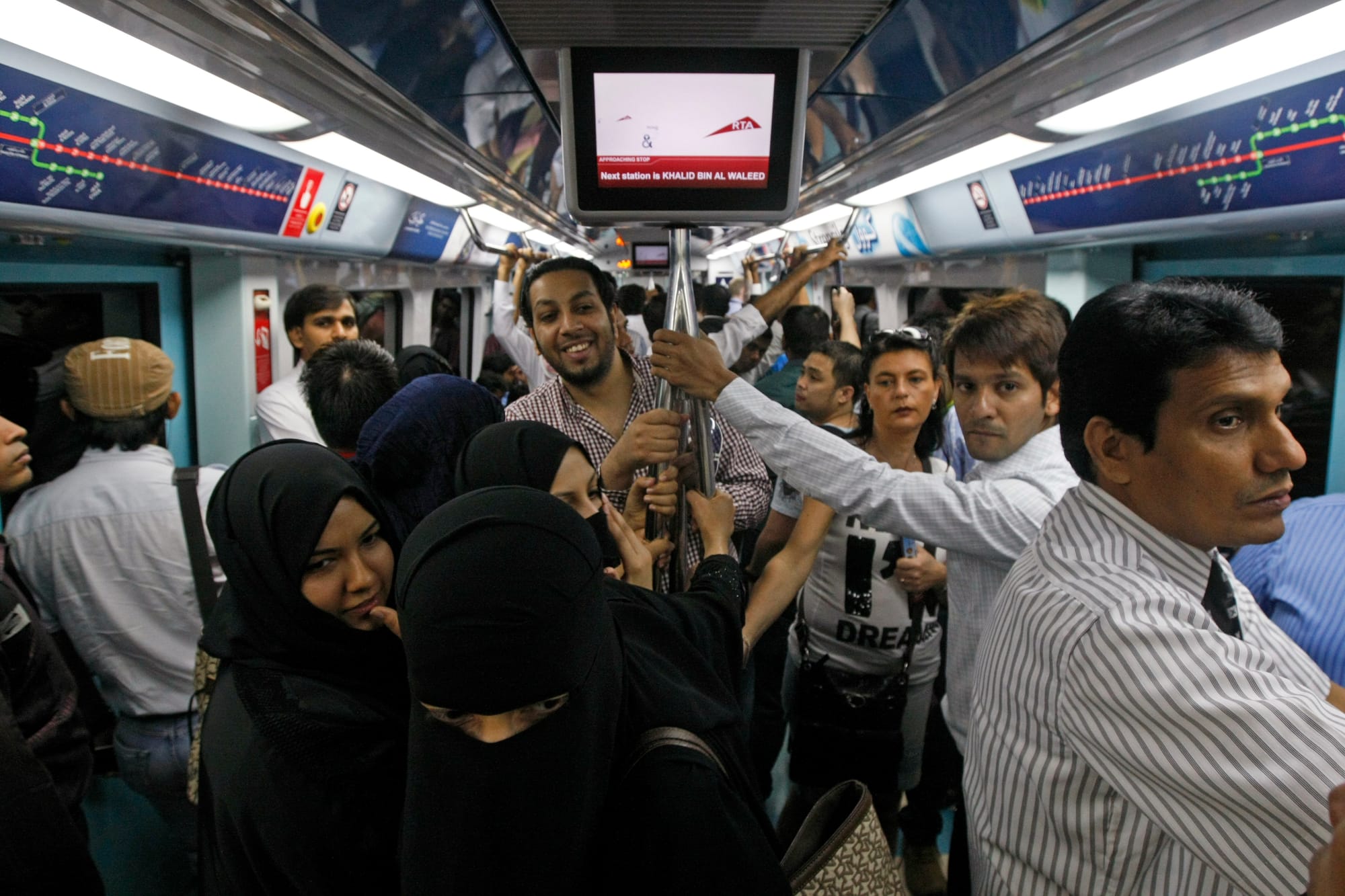Commuters inside Dubai Metro