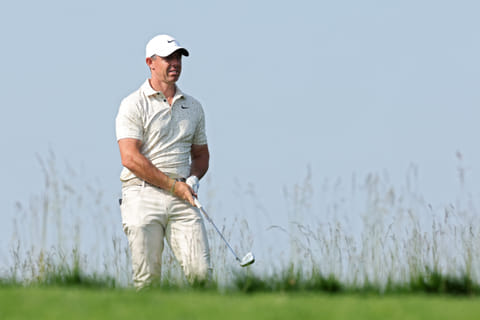 Rory McIlroy of Northern Ireland watches his shot on the 15th hole during the first round of the 125th US Open at Oakmont Country Club.