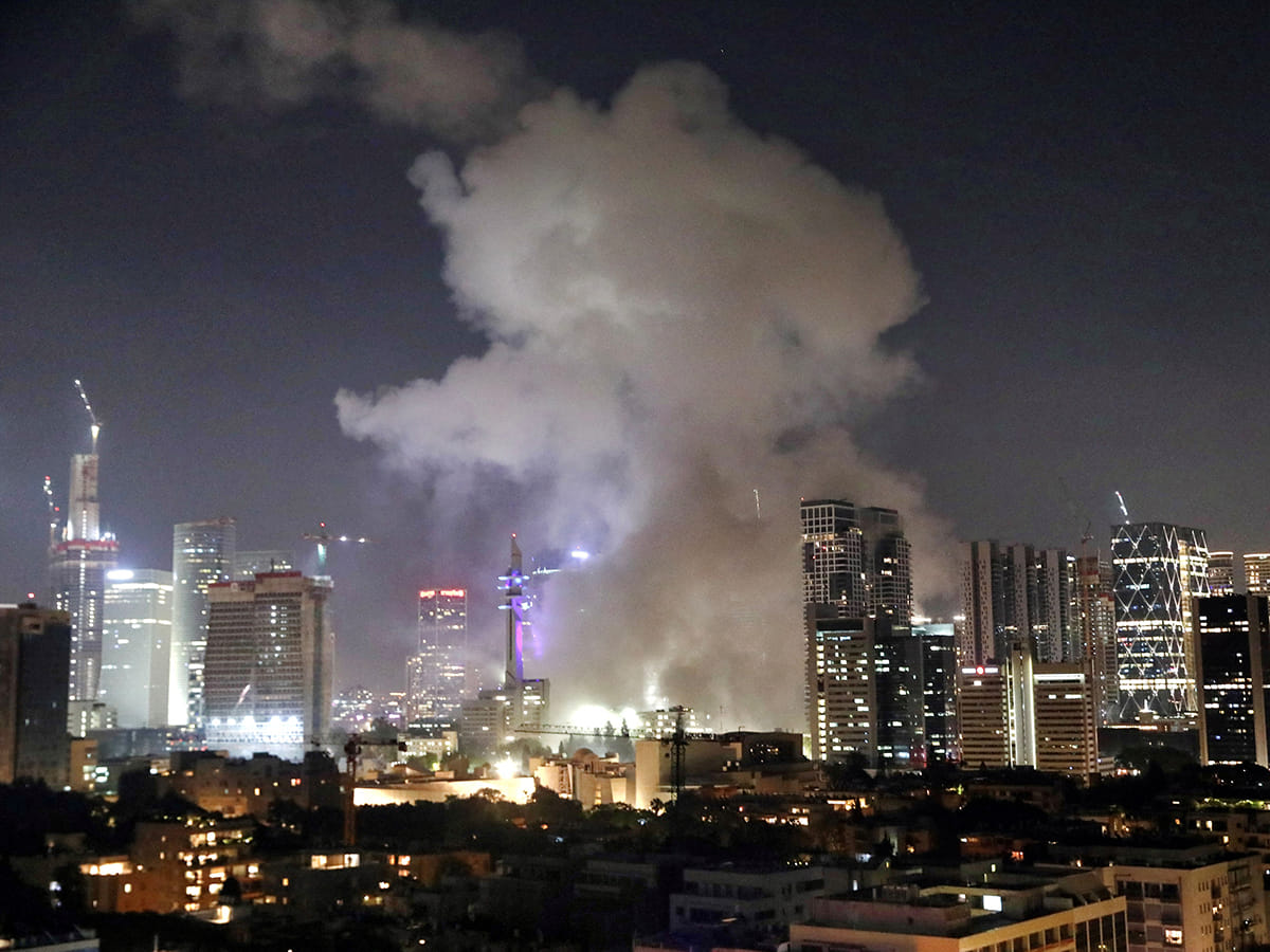 Smoke billows following a missile attack from Iran, in Tel Aviv on Saturday. 