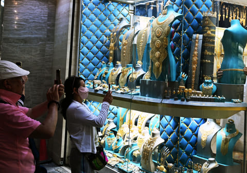 Most shoppers for the time being are admiring jewellery collections on display at gold stores in the UAE. But even with record prices, some are actually buying too.