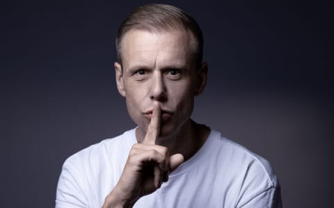 Dutch DJ and record producer Armin van Buuren poses during a photo session in Paris on June 16, 2025.