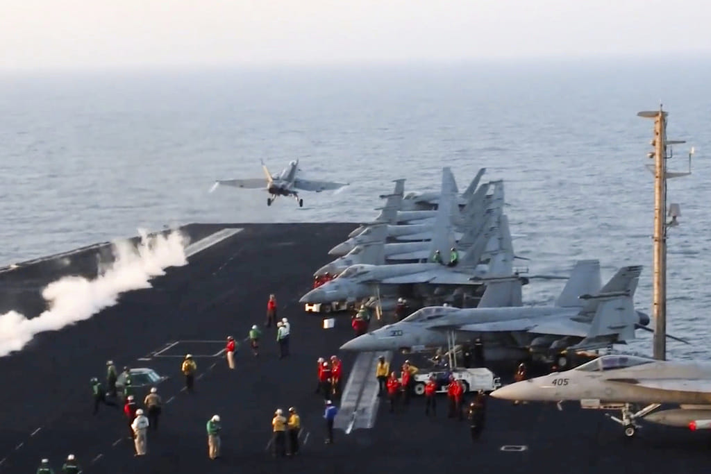 This image taken from video provided by the U.S. Navy shows an aircraft launching from the USS Harry S. Truman in the Red Sea before airstrikes in Sanaa, Yemen, March 15, 2025.  