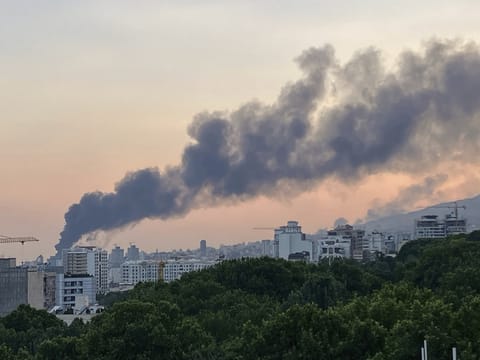 Smoke rises from the building of Iran's state-run television after an Israeli strike in Tehran, Iran, Monday, June 16, 2025. 