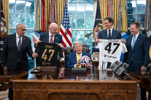 US President Donald Trump makes remarks as he meets with members of the Juventus Football Club team during a press availability in the Oval Office at the White House on June 18, 2025 in Washington, DC. The US is hosting the FIFA Club World Cup, an international soccer tournament organised by FIFA featuring club teams from around the world.