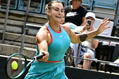 Belarus' Aryna Sabalenka returns a ball to Spain's Rebeka Masarova in their women's singles tennis match during the Berlin Open on June 19, 2025. The match was halted the previous day due to poor light and dew.