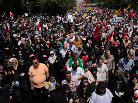 Iranian worshippers attend a protest to condemn Israeli attacks on multiple cities across Iran, after the Friday prayers ceremony in Tehran, Iran, Friday, June 20, 2025. 