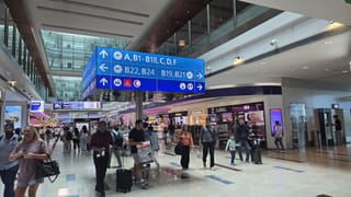 Travellers at Dubai International Airport as demand rises ahead of Eid Al Adha, with airlines gradually restoring flight capacity.