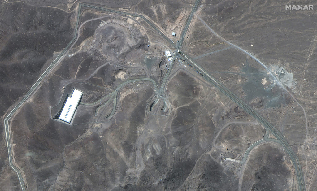 A satellite image shows vehicles at the Fordow enrichment facility in Iran.